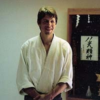 Shihan Brian Workman smiling in Hakkoryu Dojo